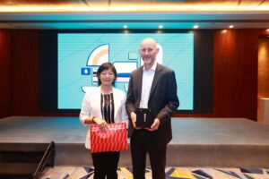 Ms. Jing Li, Director of Standard Innovation Development Division, Shanghai Municipal Administration for Market Regulation and Adrian Sym, Chief Executive, AWS