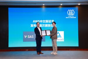 Mr. Weimin Fang, Greater China Systems Vice President, TÜV Rheinland, presents two of the first Chinese language AWS certificates to Luxshare