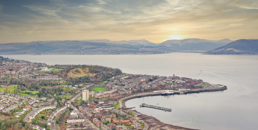 A community alongside a river. iStock/ Richard Johnson