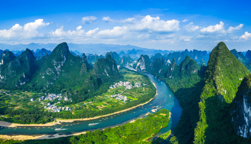 r karst mountain and river with green valley landscape in Guilin, China. Credit: istock/zhaojiankang
